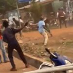 Some members of NPP and NDC pelting stones at each other