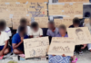 BBC "We are treated like animals in a cage" says one protest sign put up by the Tamil migrants, who cannot be identified for legal reasons