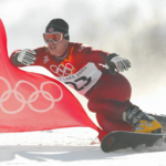 Ryan Wedding of Canada competes in the qualifying round of the men's parallel giant slalom snowboarding event during the Salt Lake City Winter Olympic Games at the Park City Mountain Resort in Park City, Utah.  Adam Pretty/Getty Images