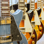 Gibson guitars | photo by Geoff Alexander via Wikimedia Commons