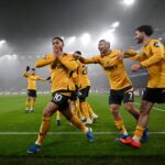 Cunha scores from corner as Wolves beat 10-man Man Utd