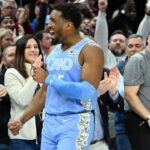 Cavaliers book play-off spot with win against Heat