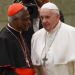 Cardinal Peter Appiah Turkson (L) with Pope Francis