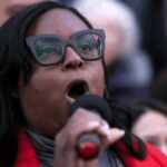 US congresswoman charged with assault outside immigration centre