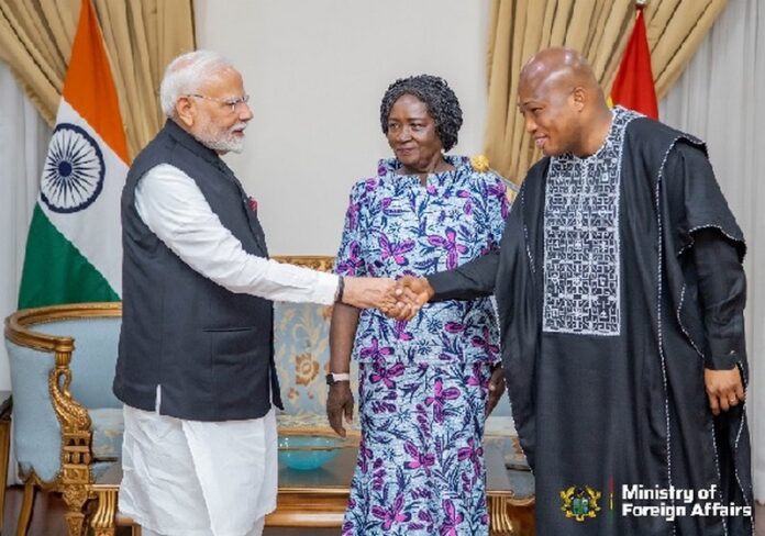 Samuel Okudzeto Ablakwa, Foreign Minister greets Narendra Modi, India Prime Minister while Professor Naana Jane Opoku Agyemang, Vice President of the Republic looks on