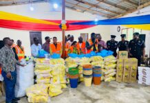 Greater Accra Minister leads donation to flood, fire victims in Madina and Adenta