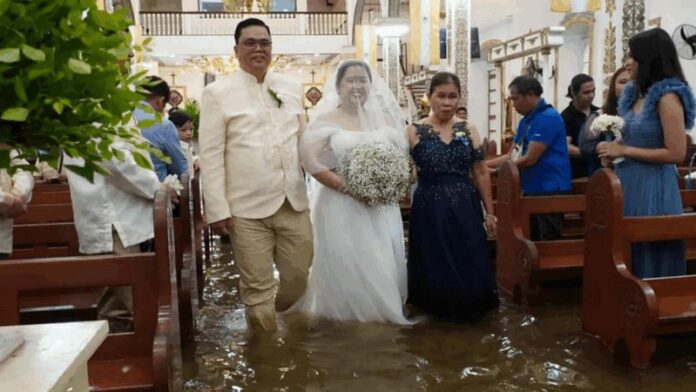 Why Filipino couples keep getting married in flooded churches