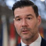 Swedish minister reveals teenage son linked to extremist groups