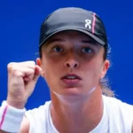 Swiatek toils in second-round win over Lamens