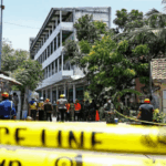 Ambulances line up near collapsed Indonesian school building as search for trapped students continues