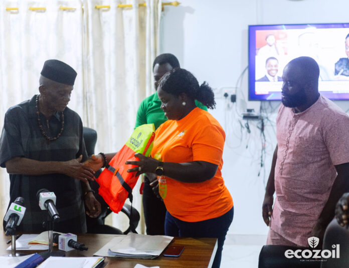 Oti Regional Minister, John Kwadwo Gyapong being presented with some life jackets