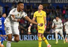 Real Madrid go top of La Liga as protests continue