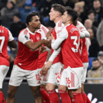 Arsenal return to the top with victory at Everton
