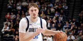 Teenager Flagg makes history in Mavericks defeat