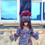 GWR: Nigerian woman sets record with wig taller than three-storey building