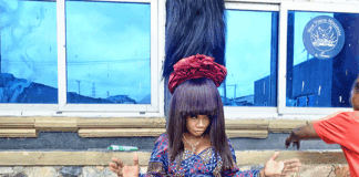 GWR: Nigerian woman sets record with wig taller than three-storey building