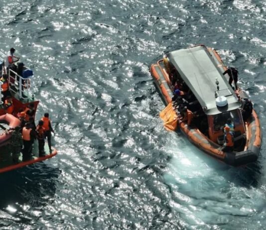 Indonesian rescuers find a second body as search for Spanish soccer coach and 2 children extended