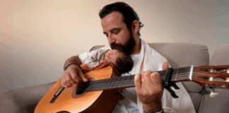 Musician pens beautiful tribute song that tells son “I love you” in over 500 languages