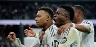 Real Madrid edge past nine-man Rayo Vallecano through 99th-minute penalty from Mbappe