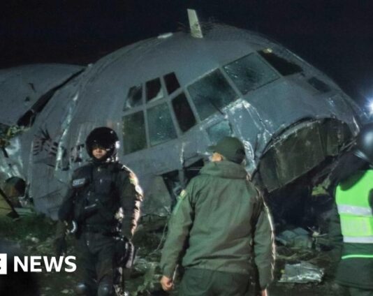 At least 20 killed after military plane carrying banknotes crashes in Bolivia