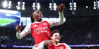 Arsenal put four past Tottenham to go five points clear