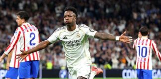 Vinicius double helps Real Madrid edge Atletico thriller