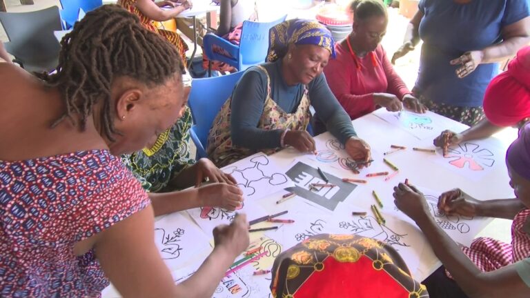 Mallam Atta market women colour to relieve stress and learn digital safety