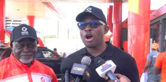 GOIL MD and Azumah Nelson serve customers in Ghana Month celebration