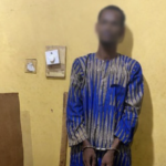 Suspected robber dies after leaping from moving police vehicle