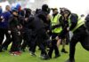‘Shameful’ pitch invasion by Celtic and Rangers fans condemned by police