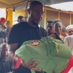 Aduana FC CEO visits family of late Dominic Frimpong, presents player’s personal bag