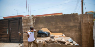 Taskforce demolishes fence wall for encroaching on cul-de-sac in Awudome Estate