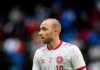 Christian Eriksen ‘conscious and doing well’ after collapsing on pitch