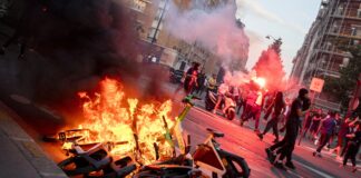 Hundreds arrested and dozens of police injured after Champions League riots in France