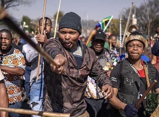 South Africa says more than 53,000 foreigners deported in migration campaign