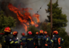 Two firefighting helicopters collide in Greece wildfires, Hungary shuts nuclear plant
