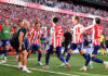 Atletico beat 10-man Real in feisty Madrid derby