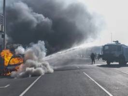Cars torched and shops looted as anti-migrant violence erupts in South Africa