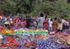 Hundreds salvage clothes after cargo truck catches fire on Ekumfi-Mankessim road (Photos)